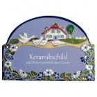Keramikschild 23,5 x 17,0 cm Vier G�nse vor Haus mit Blumenumrandung hellblau