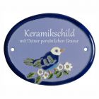 Keramikschild 11,5 x 9,0 cm Ein Vogel auf einem Ast hellblau