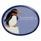 Keramikschild 14,5 x 12,0 cm Pinguin auf Eisscholle hellblau